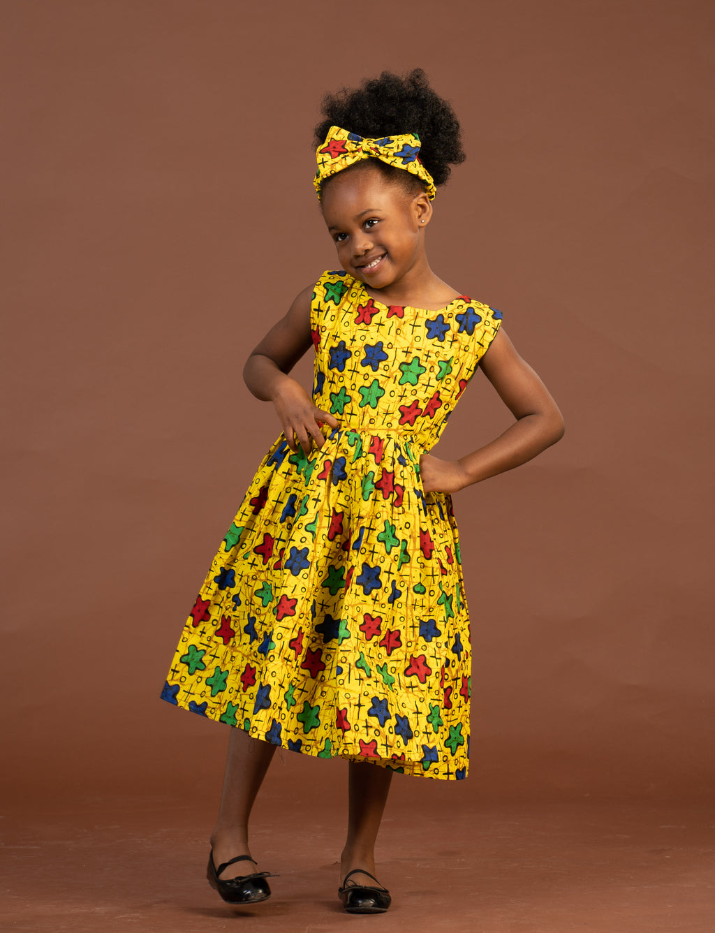 Taraji Ankara girls dress | Yellow stars African Print