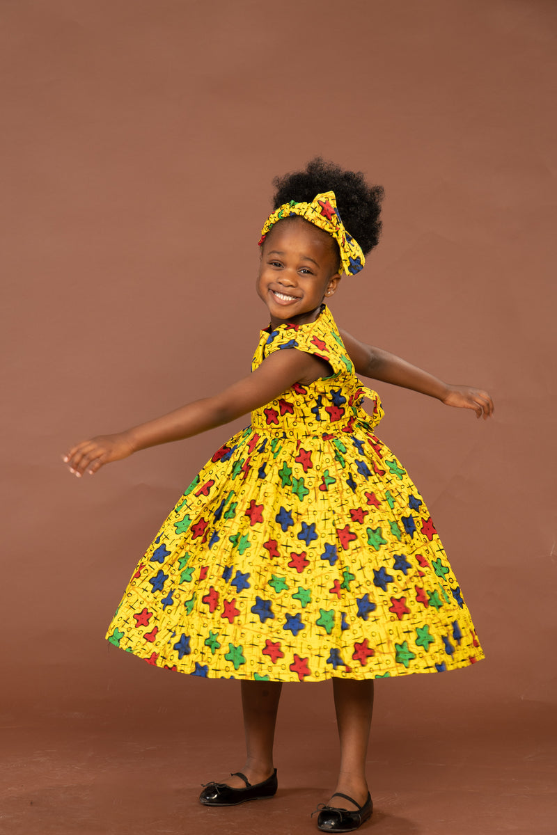 Taraji Ankara girls dress | Yellow stars African Print