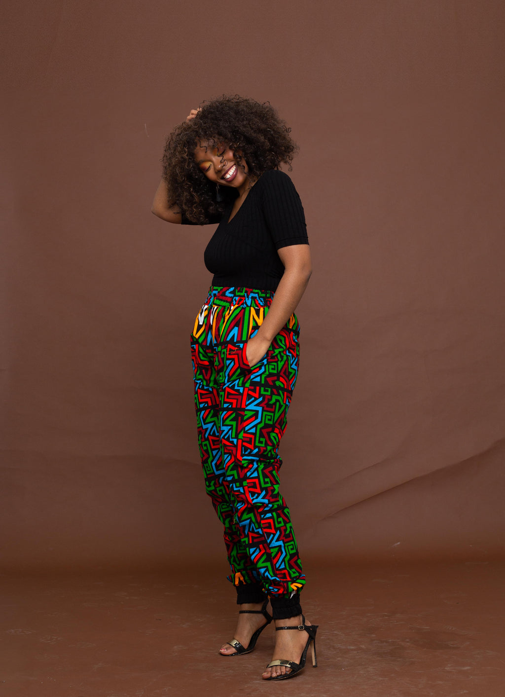 Anika High Waisted Trouser | Red and Green Multicoloured African Print